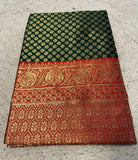 { "alt_text": "Dark green jacquard printed saree with unstitched blouse, 5.5m, ethnic wear, Indian traditional clothing" }