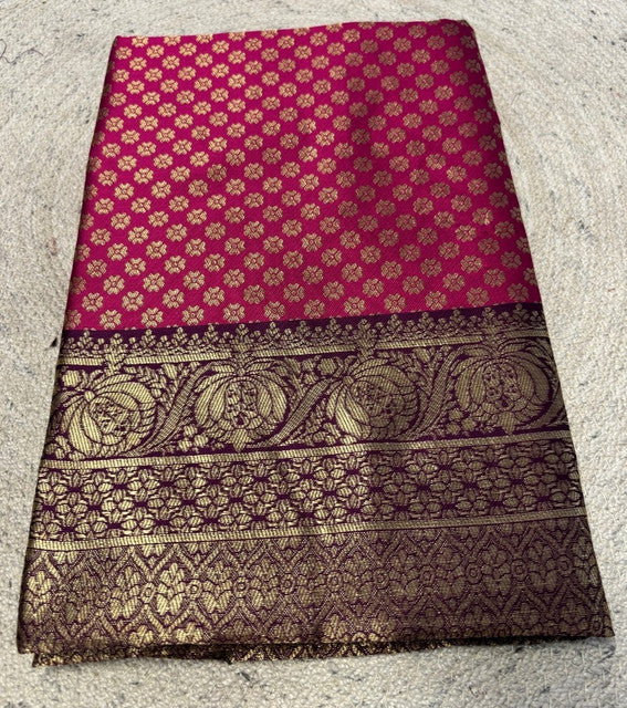 { "alt_text": "Pink jacquard printed saree with unstitched blouse, 5.5m, ethnic wear, Indian traditional clothing" }