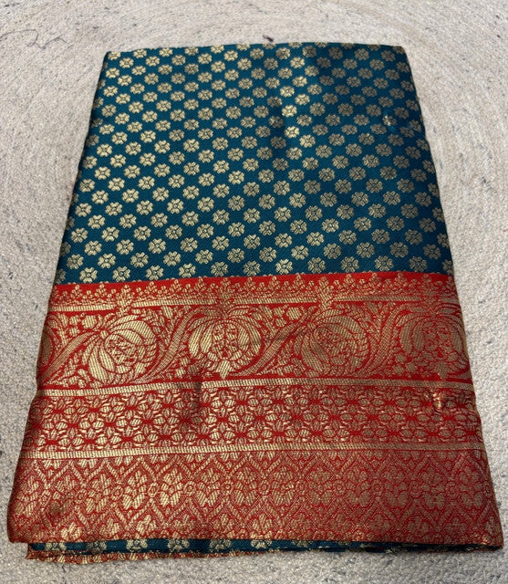 { "alt_text": "Teal jacquard printed saree with unstitched blouse, 5.5m, ethnic wear, Indian traditional clothing" }