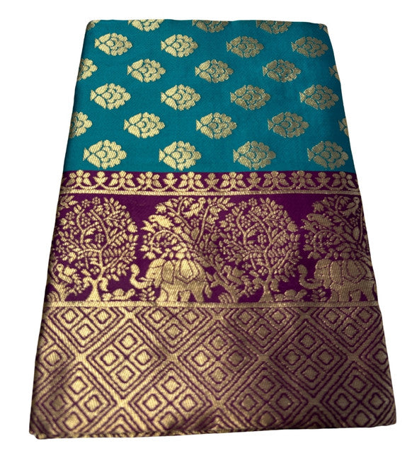 { "alt_text": "Turquoise jacquard printed saree with unstitched blouse, 5.5m, ethnic wear, Indian fashion" }