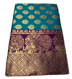 { "alt_text": "Turquoise jacquard printed saree with unstitched blouse, 5.5m, ethnic wear, Indian fashion" }