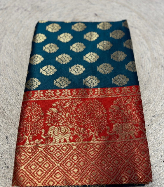 { "alt_text": "Teal jacquard printed saree with unstitched blouse, 5.5m, ethnic wear, Indian traditional clothing" }
