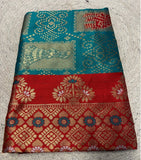 { "alt_text": "Teal jacquard printed saree with unstitched blouse, 5.5m, ethnic wear, Indian traditional clothing" }