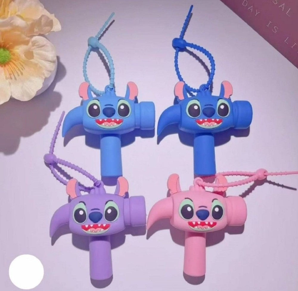 Multicolor rubber hammer keychain toy with cartoon design and smooth finish