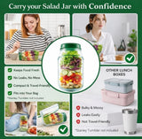 Green plastic layered salad container with airtight lid and built-in dressing cup for meal prep