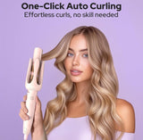 Pink plastic and stainless steel automatic hair curler with adjustable temperature settings for styling hair