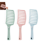 Multicolor plastic detangling hair brush with vented design for wet or dry hair grooming