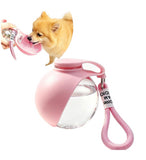 Pink plastic and silicone dog water dispenser with leak-proof gravity feed system for pets