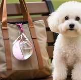 Pink plastic and silicone dog water dispenser with leak-proof gravity feed system for pets