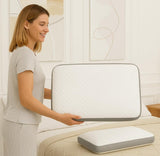 White-grey orthopedic memory foam pillow providing therapeutic support for neck and shoulder alignment