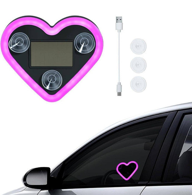 Pink heart-shaped neon car light with solar charging and multiple flashing modes for dashboard or window display