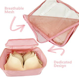 Pink nylon 7-piece travel packing cube set with various organizers for clothes, shoes, and toiletries