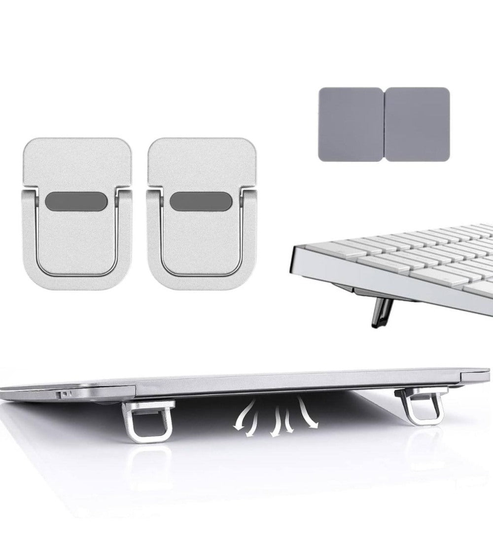 Silver foldable mini laptop stand made of zinc alloy for ergonomic viewing and heat dissipation