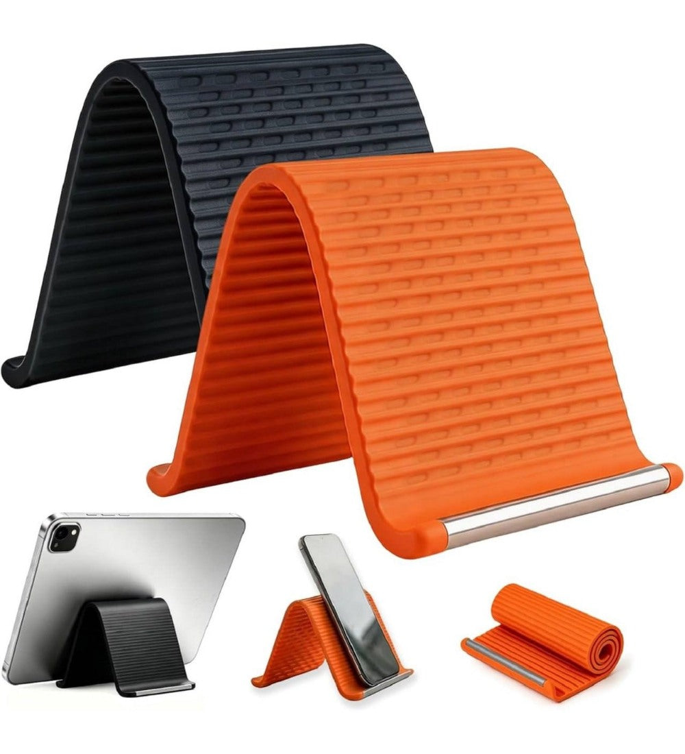 Orange and black silicone phone holder with adjustable aluminum support for universal smartphone and tablet compatibility