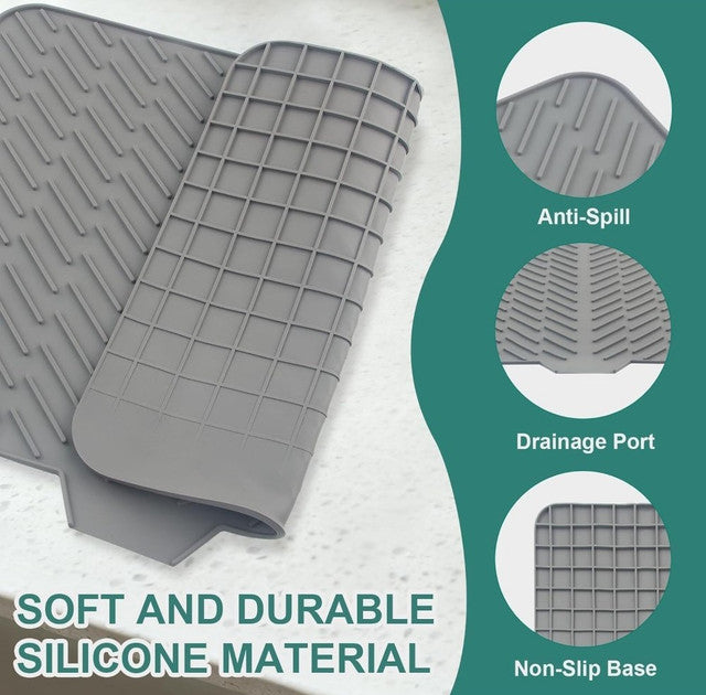 Grey silicone dish drying mat with built-in drain spout, non-slip, and heat resistant for kitchen use