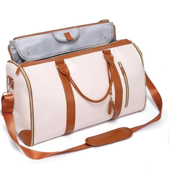 Beige faux leather and canvas 2-in-1 convertible travel duffel bag with shoulder strap and multiple pockets