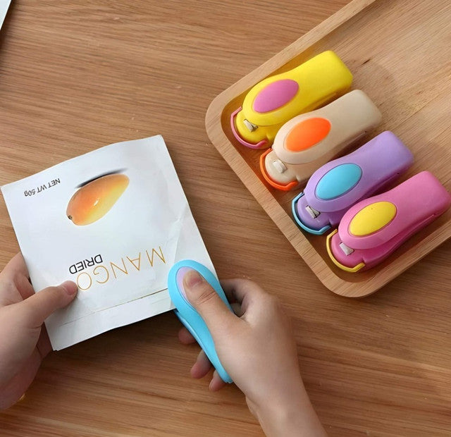 Multicolor portable mini electric heat sealing machine for sealing snack bags and food storage pouches