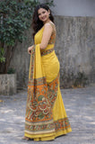 Yellow linen Kalamkari printed saree with unstitched blouse piece, 5.5 meters length