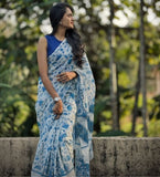 White and blue linen saree with floral print and unstitched blouse piece, 5.5 meters length