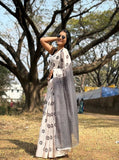 White linen floral printed saree with unstitched blouse piece, 5.5 meters length
