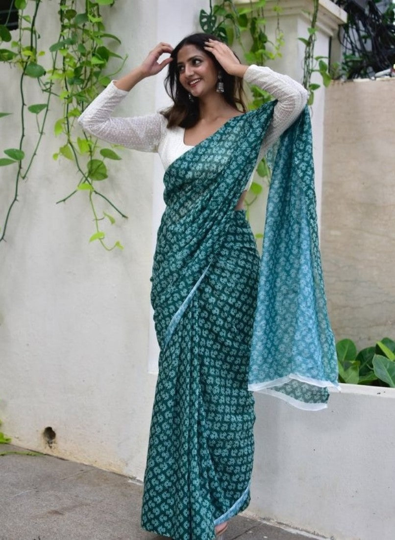 Teal green linen floral printed saree with unstitched blouse piece, 5.5 meters length