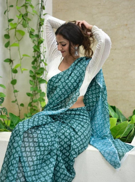 Teal green linen floral printed saree with unstitched blouse piece, 5.5 meters length