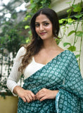 Teal green linen floral printed saree with unstitched blouse piece, 5.5 meters length