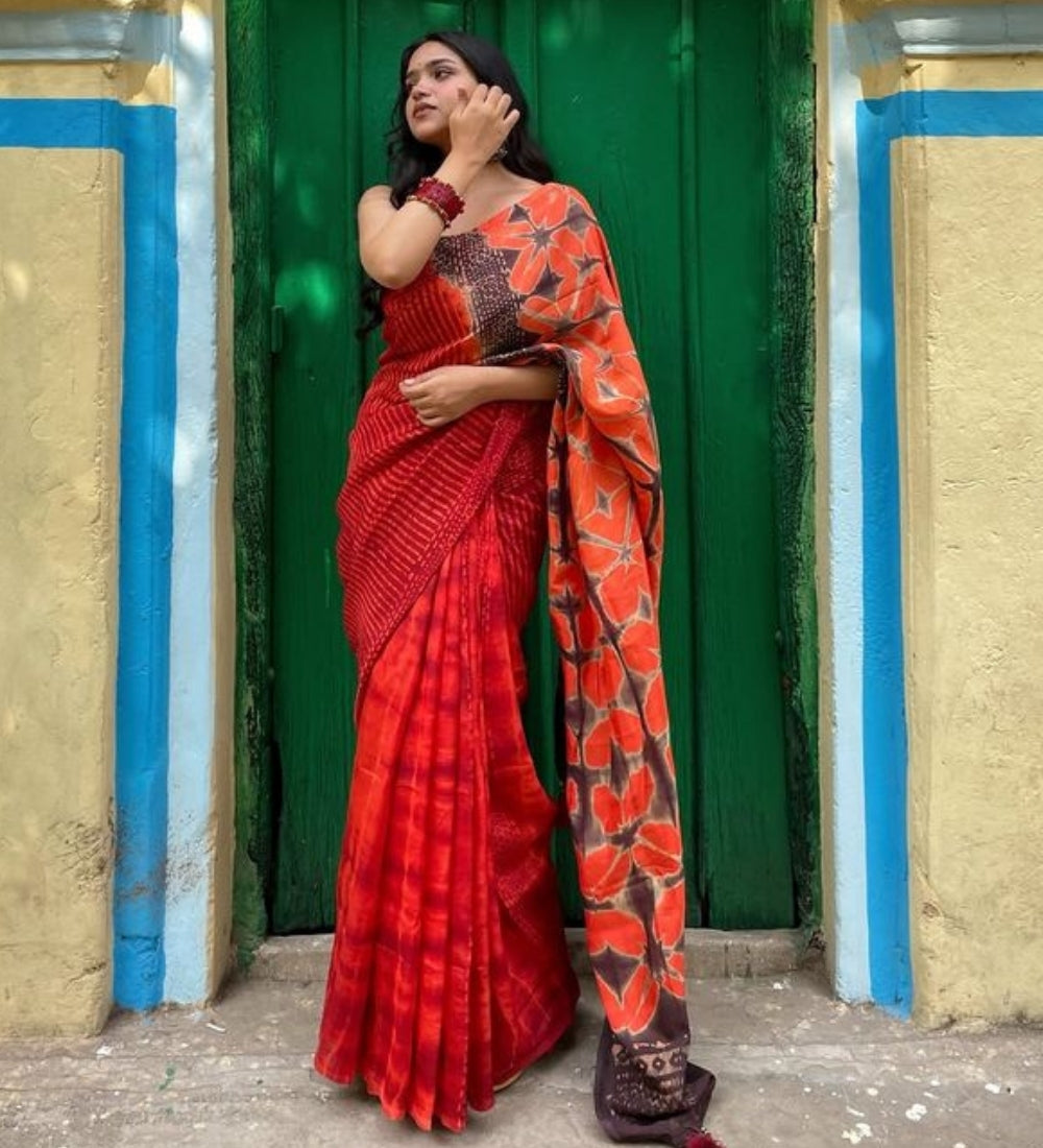 Red-orange linen floral printed saree with unstitched blouse piece, 5.5 meters length