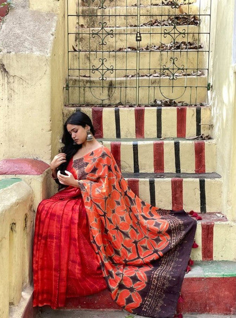 Red-orange linen floral printed saree with unstitched blouse piece, 5.5 meters length