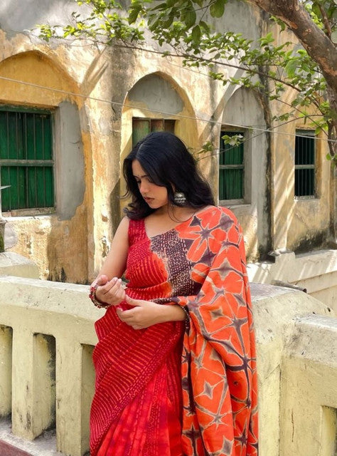 Red-orange linen floral printed saree with unstitched blouse piece, 5.5 meters length