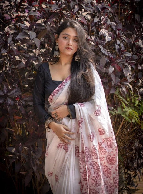 White and red linen saree featuring paisley print with unstitched blouse piece, 5.5 meters length