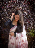 White and red linen saree featuring paisley print with unstitched blouse piece, 5.5 meters length