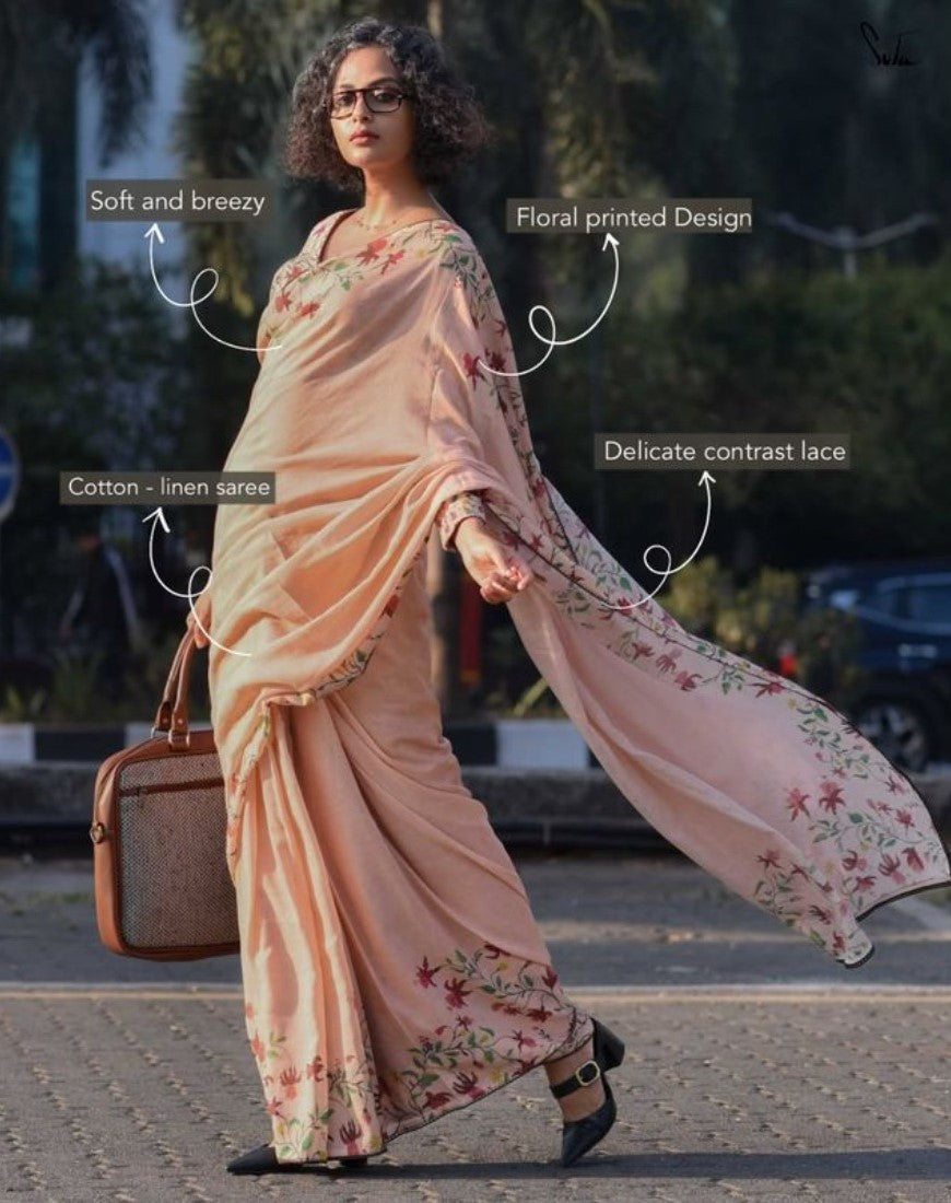 Peach linen floral printed saree with unstitched blouse piece, 5.5 meters length
