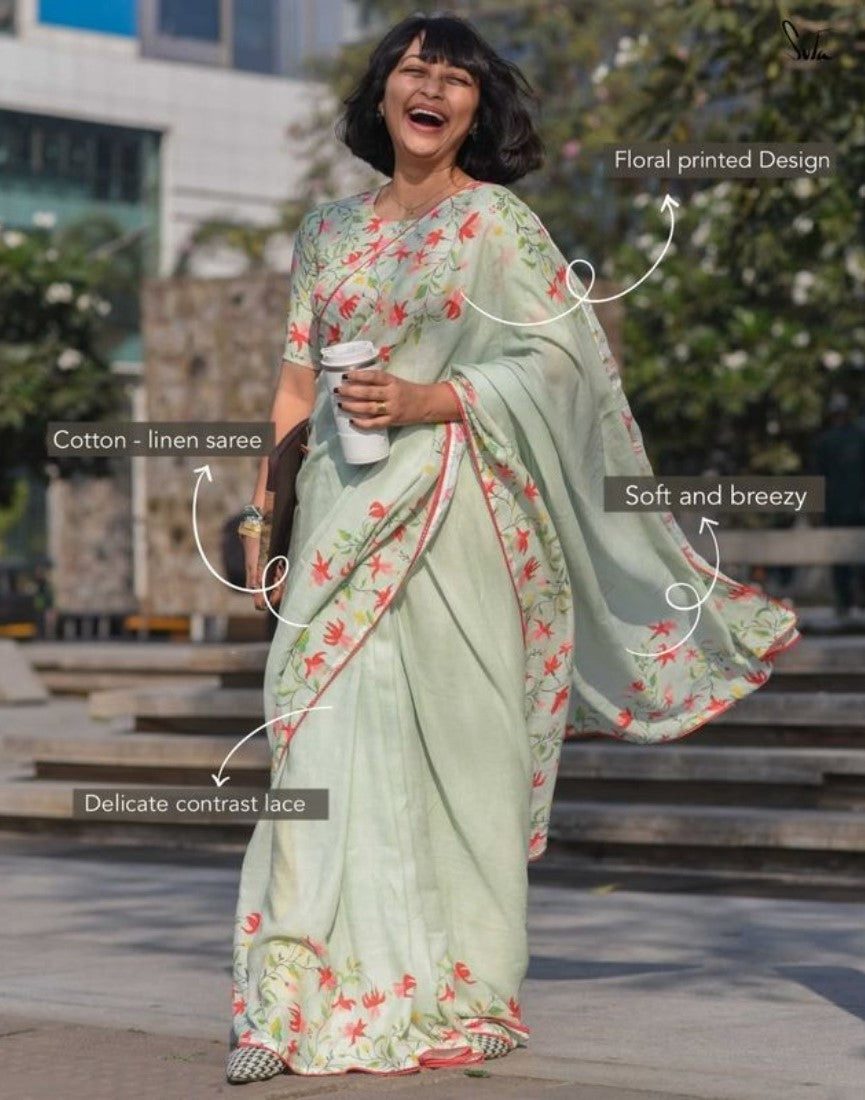 Light green linen saree with floral print and unstitched blouse piece, 5.5 meters length