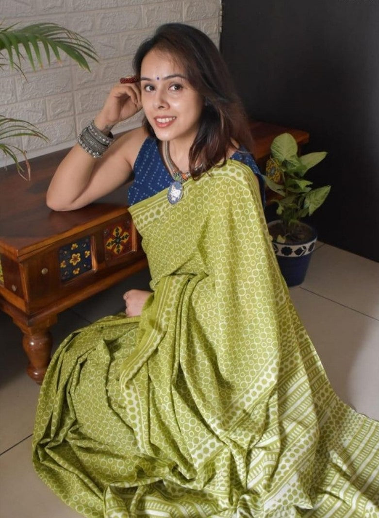 Green linen printed saree with unstitched blouse piece, 5.5 meters length, traditional Indian wear