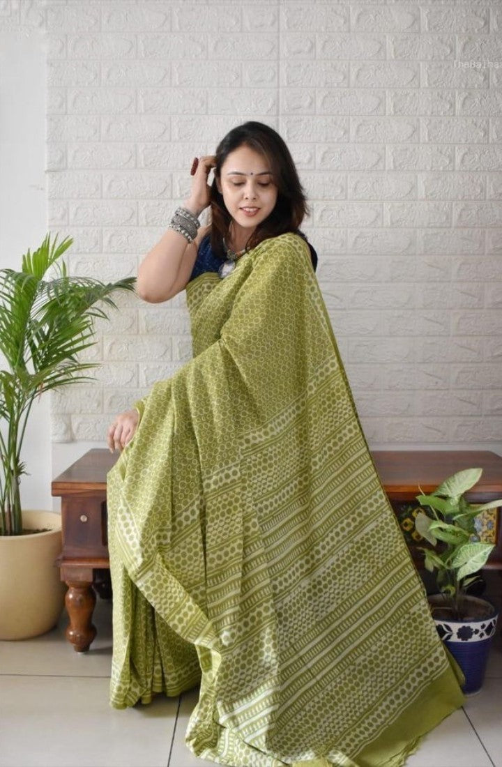 Green linen printed saree with unstitched blouse piece, 5.5 meters length, traditional Indian wear