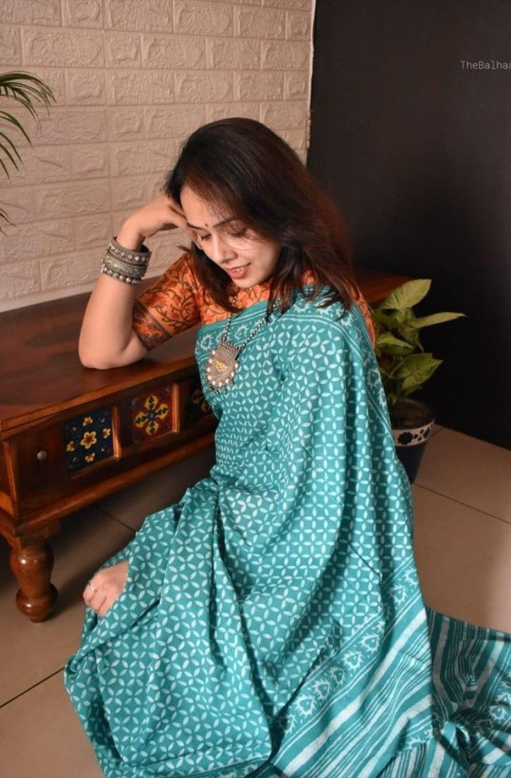 Teal linen printed saree with unstitched blouse piece, 5.5 meters length, traditional Indian wear