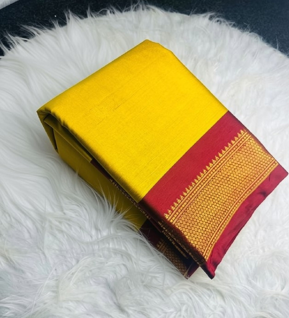 Yellow-red solid cotton silk saree with unstitched blouse piece, 5.5 meters length