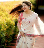 Off white linen saree with floral print and unstitched blouse piece, 5.5 meters length