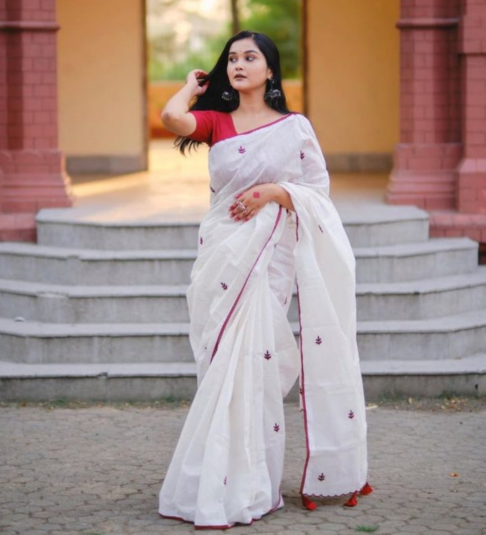 White and red linen embroidered saree with unstitched blouse piece, 5.5 meters length