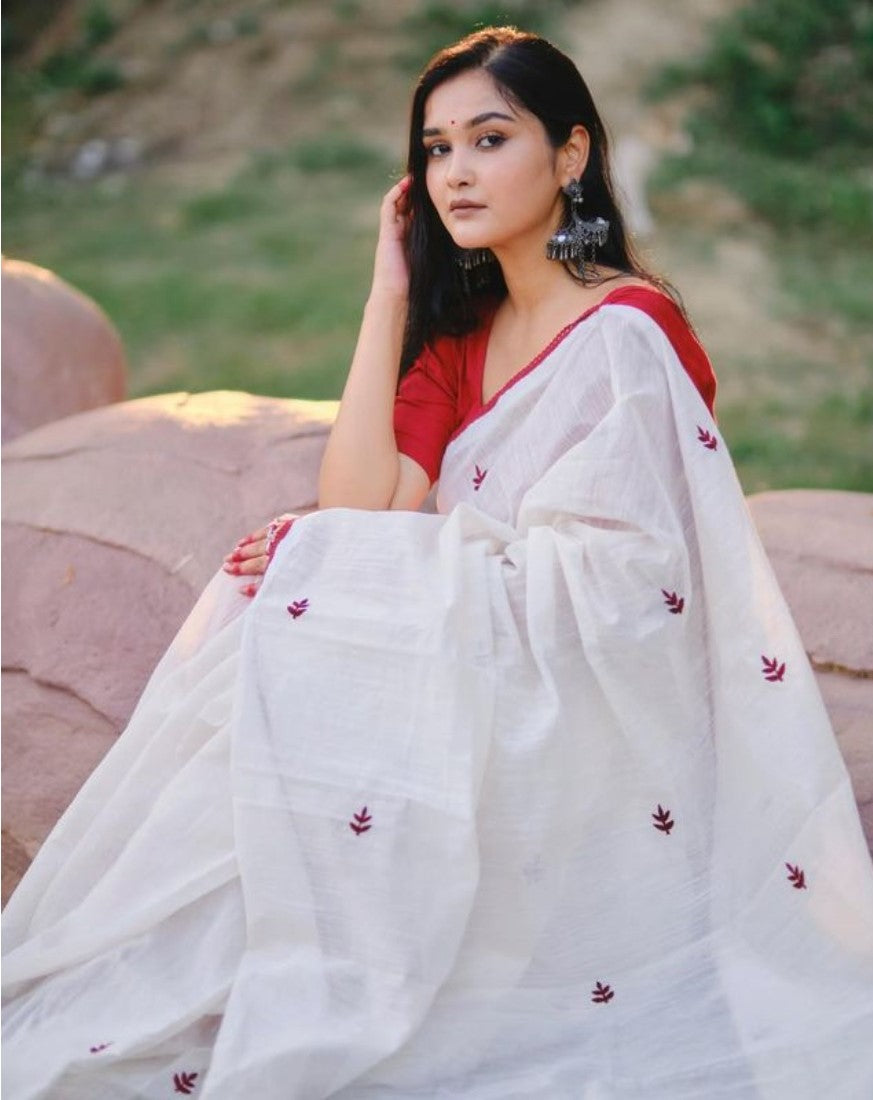 White and red linen embroidered saree with unstitched blouse piece, 5.5 meters length