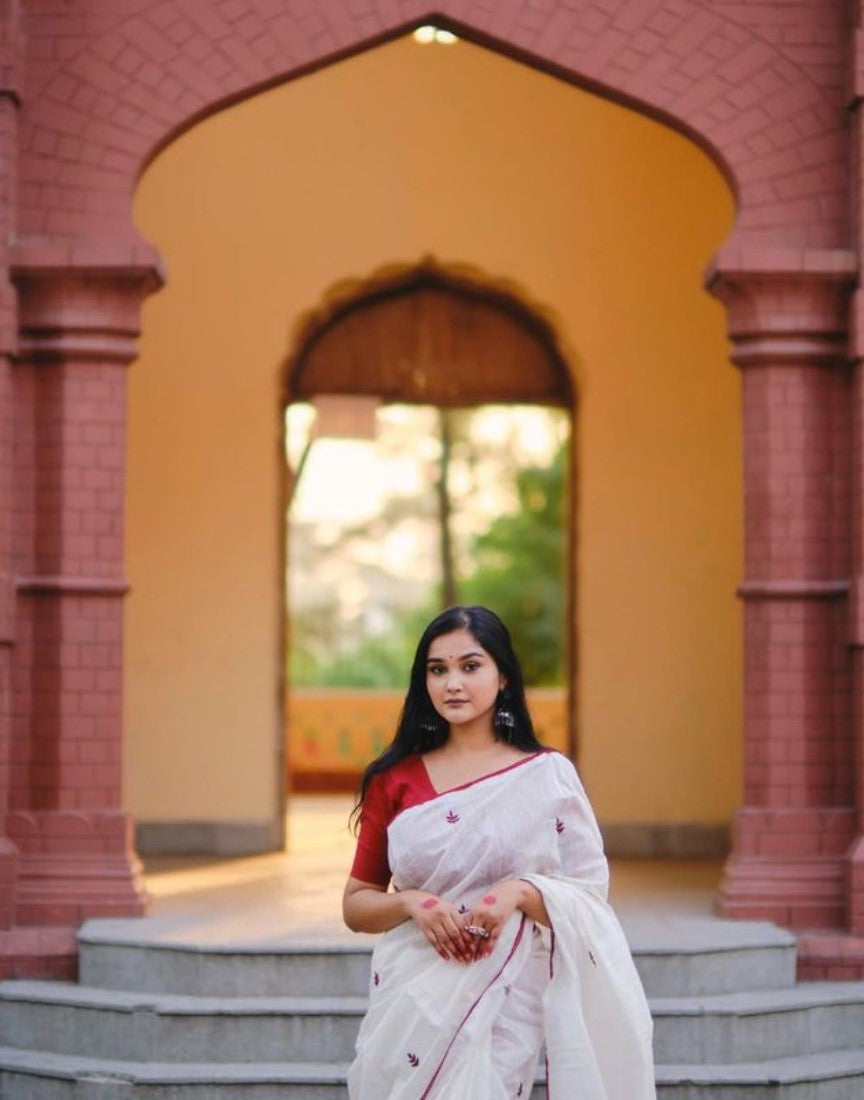 White and red linen embroidered saree with unstitched blouse piece, 5.5 meters length