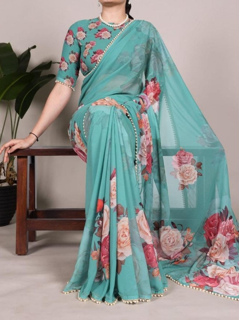 Aqua blue georgette floral printed saree with unstitched blouse piece, 5.5 meters length