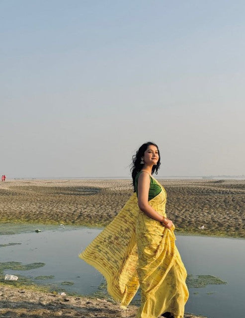 Yellow linen floral printed saree with unstitched blouse piece, 5.5 meters length