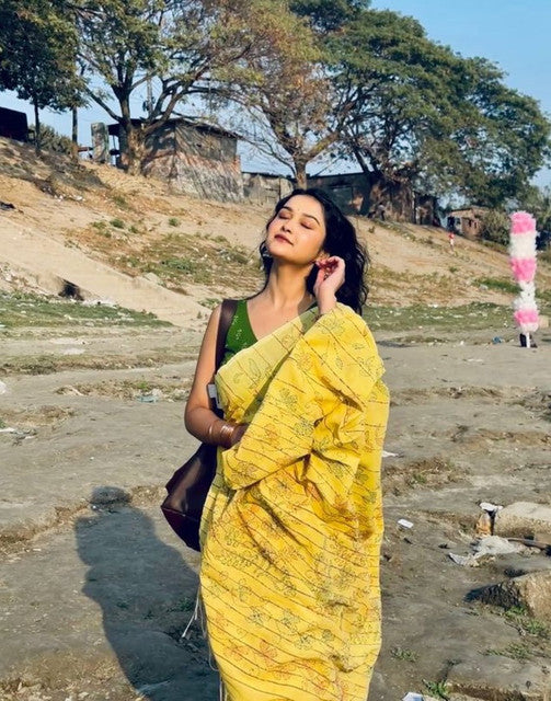 Yellow linen floral printed saree with unstitched blouse piece, 5.5 meters length