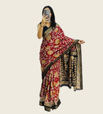 Maroon linen saree featuring floral prints, includes 5.5 meters of fabric and an unstitched blouse piece