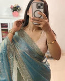 Sea green chiffon saree with embellishments and unstitched blouse piece, 5.5 meters length