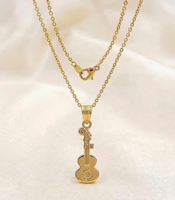 Gold plated brass pendant necklace set featuring guitar and key designs on a delicate chain