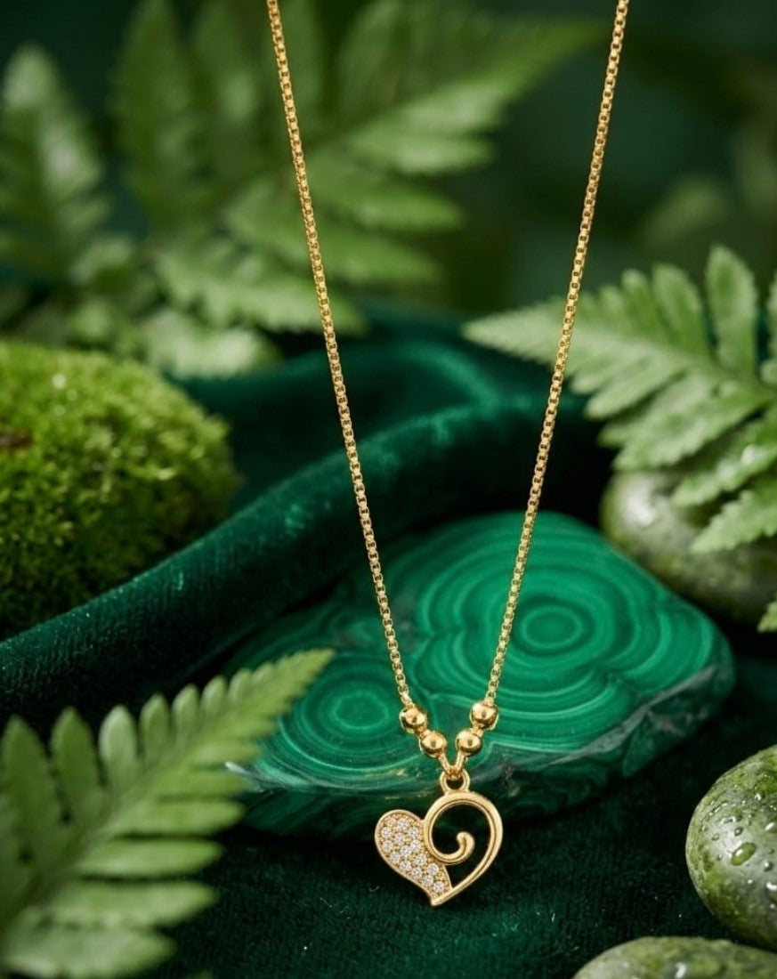 Gold plated brass necklace set featuring swirl heart pave crystal pendants on delicate chains