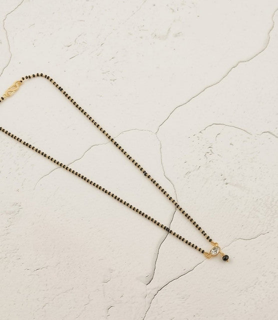 Multicolor brass gold plated mangalsutra pendant necklace featuring a solitaire crystal and black beaded chain